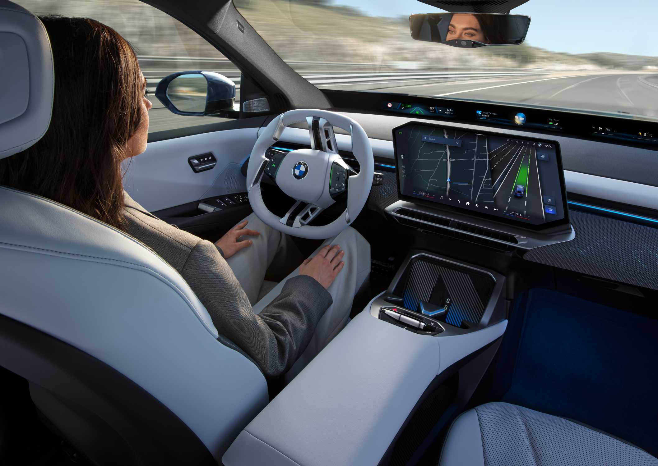 Driver with hands off the wheel in a BMW iX3 using Highway Assistant, one of the models covered by BMW image data collection.
